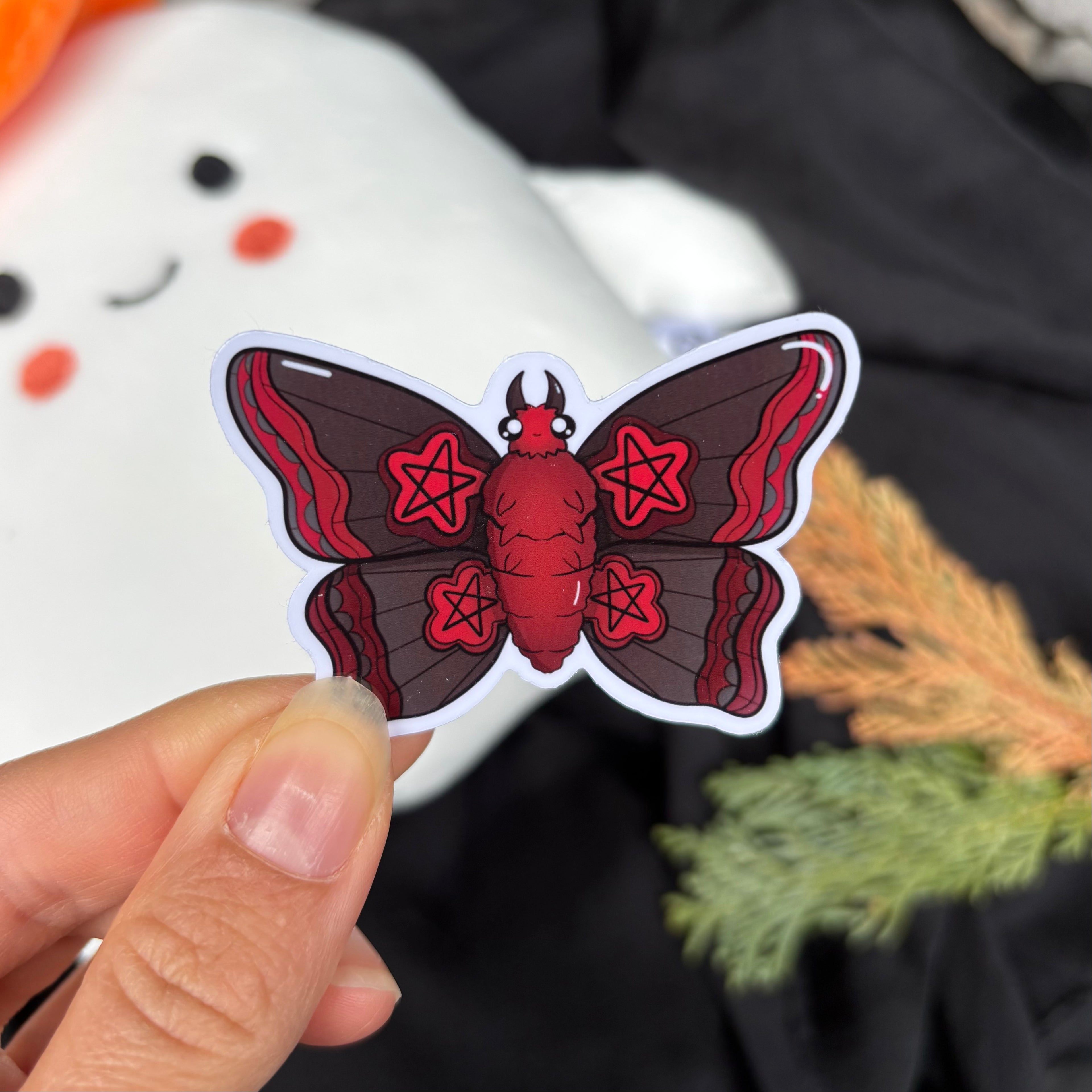 Sticker - Motte (schwarz/rot)